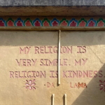 A wall engraving of HH Dalai Lama’s words.